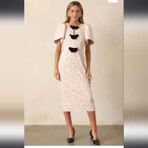 Elegant Textured Midi Dress with Black Bows